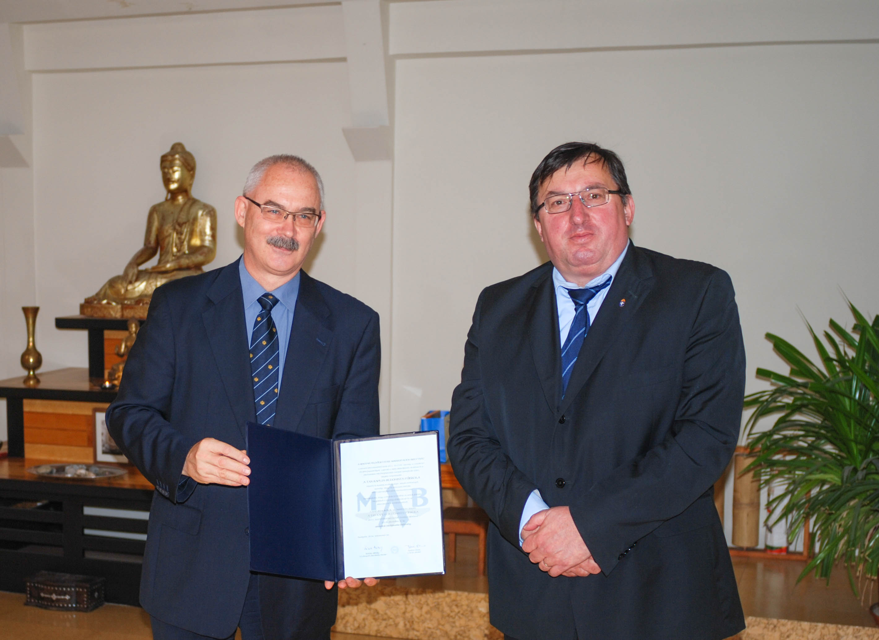 Dr. György Fodor, head of the HAC theologic committee officially handed the Accreditation Decision over to Janos Jelen, the rector of DGBC. It is  that valid until 31.12.2019