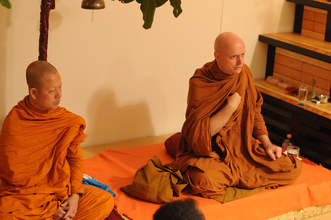 Ajahn Jayasaro theravada monk answered to the guest in the ceremony hall of the college.