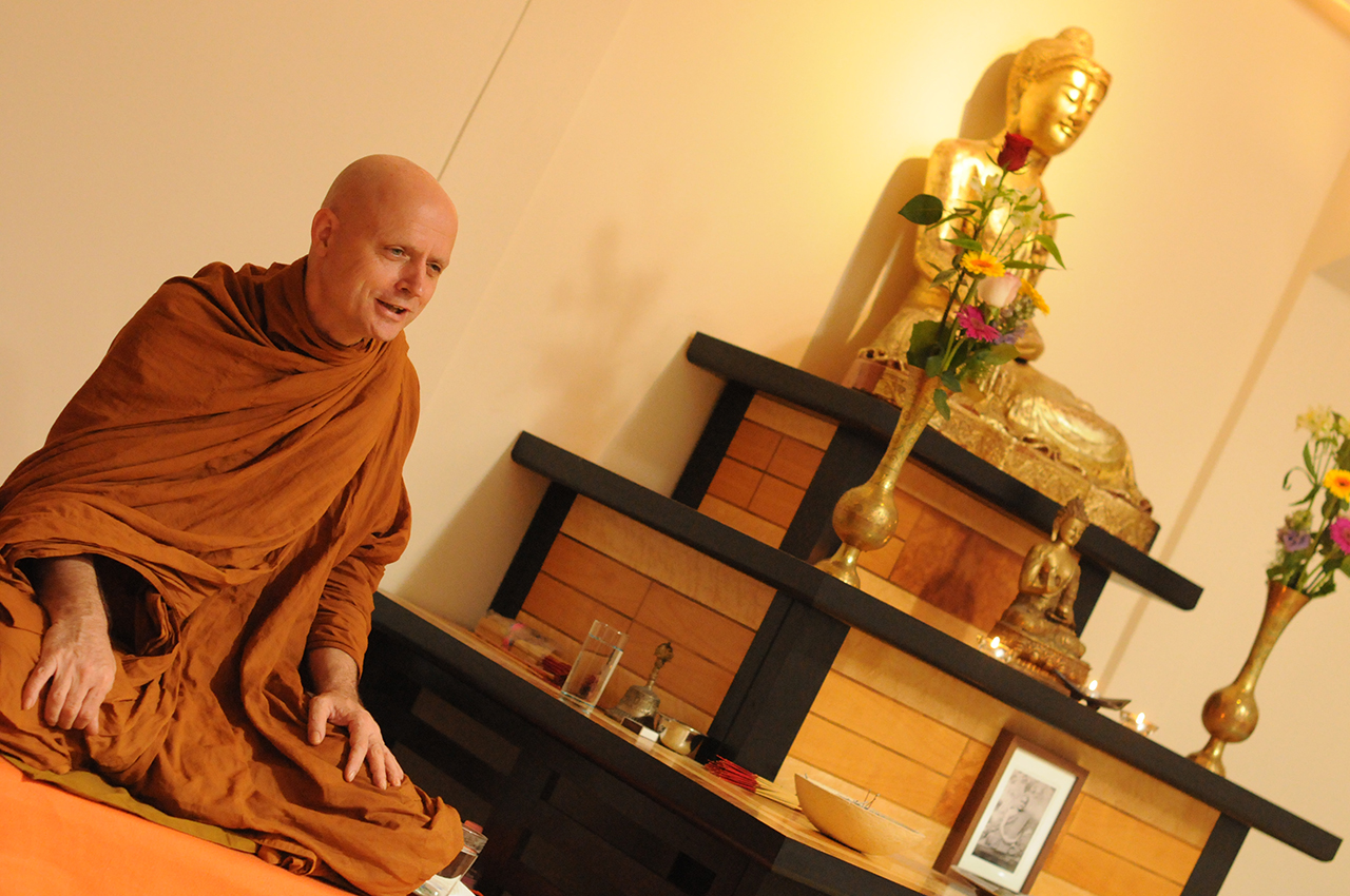 Ajahn Jayasaro theravada monk answered to the guest in the ceremony hall of the college.